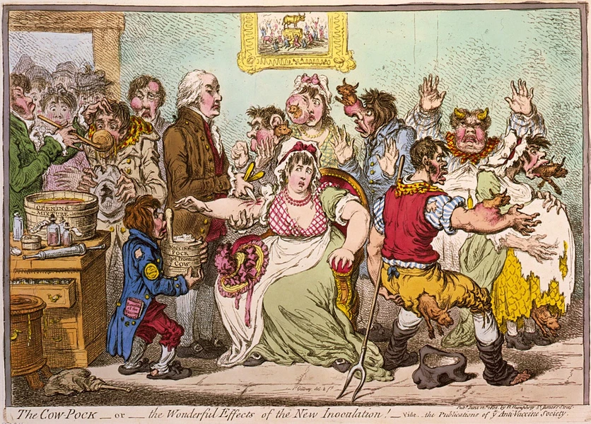 Vesmír: Strach z očkování měli lidé od samého počátku vakcinace. Na dobové karikatuře britského kreslíře Jamese Gillraye z roku 1802 očkovaným vyrážejí na čele rohy a na těle místo neštovic rovnou celé krávy.