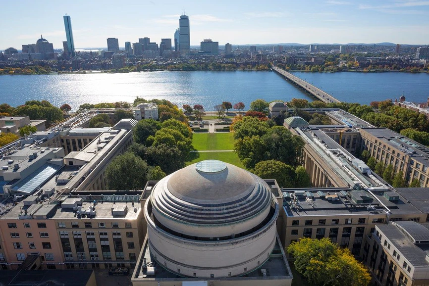 MIT: Aerial view of the campus, with a glimpse of the Boston skyline.